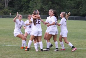 The team celebrates a goal scored against Twinsburg.