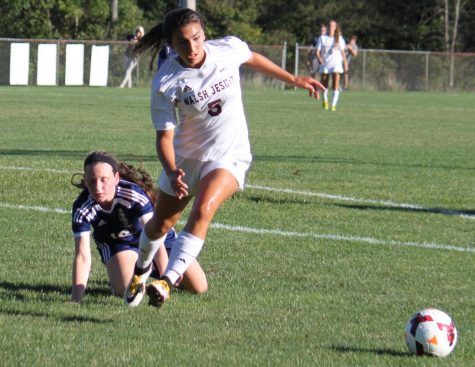 Sophomore varsity player, Bella Rosalina in a game against Twinsburg.