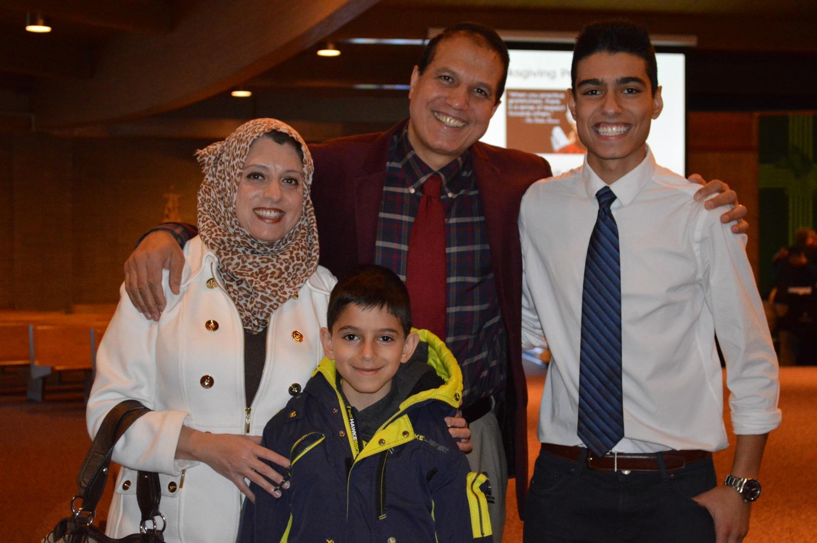 Youssef Osman and his family gather for a photo at the service. 