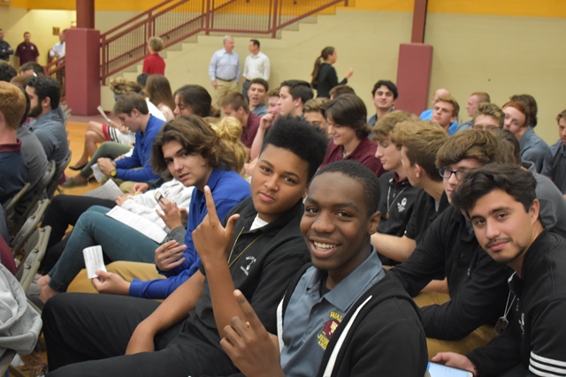 Will Daniels and Khalif Jackson sit among the senior class as they wait for Mass to begin. Will commented, “It was a great opportunity to sit next to my best friend and witness a new start to the school year.”