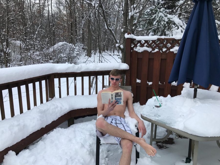 Once all the work of the snow day superstitions pays off, you too could be enjoying a wonderful day off like senior Sam Matonis. 