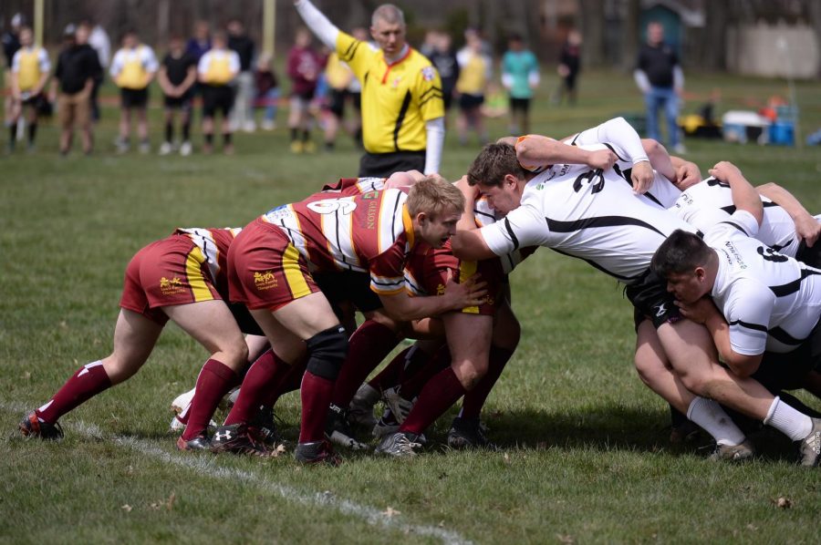 WJ ruggers scrum as they push against the opposition while the hook tries to hook the ball back with his feet. 