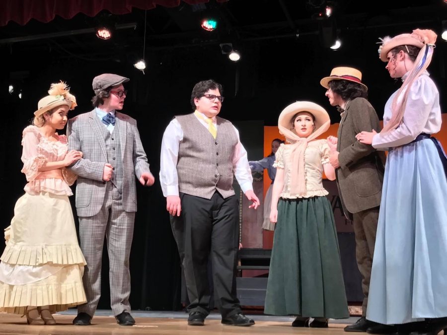 Seniors Jojo Radecky, Connor Cline, Dom Mazzulo, Jackie Ward,  Charlie Kadiar, and Margo Tipping performing in Hello Dolly!