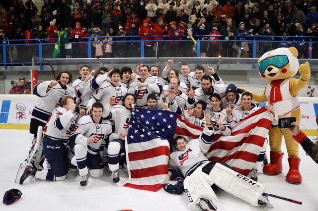 The 2019 Winter Deaflympics mens hockey gold medal team poses for a photo after their victory over Canada. 