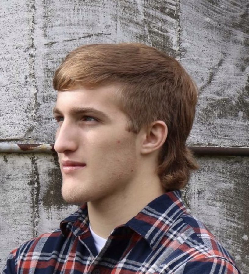 Senior Zach wiseman contemplates his mullet’s future.