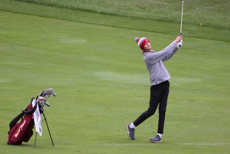 Senior Clark Nemer hits a shot on hole 12 at the Ohio State Scarlet Course. 