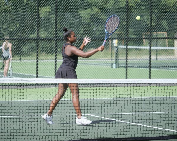 Junior Lauren Stephens serves her opponent on the new courts of the Coach Rocco A. Cona Tennis Complex.  