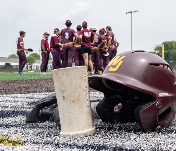 The team circles up to discuss strategy at last year's state semifinal.